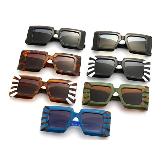 Collection of various sunglasses on a white background