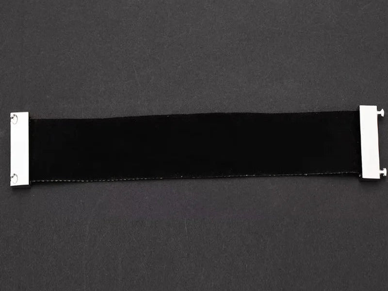 Black belt with silver buckle on a dark grey background