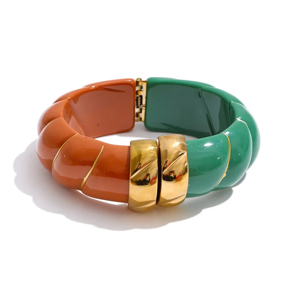 Coffee and green colour bracelet with gold clasp on a white background