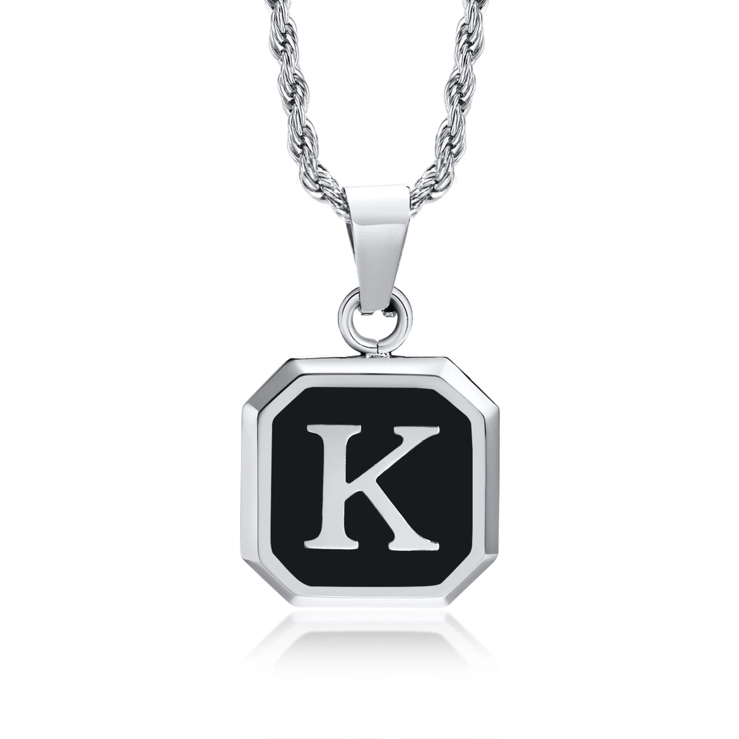 Necklace with a black and silver pendant featuring the letter 'K' on a white background