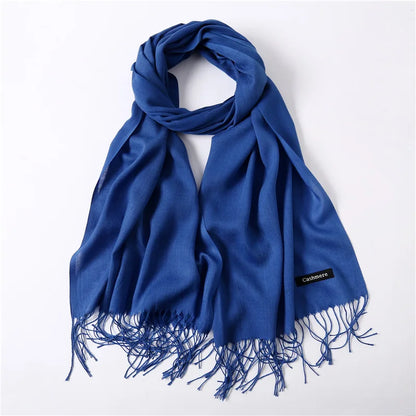 Blue scarf with fringes on a white background