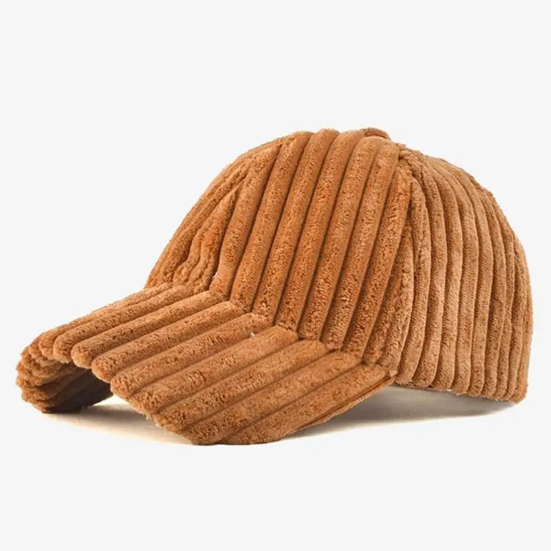 A brown corduroy baseball cap with a ribbed texture, shown from a three-quarters angle on a light grey background.