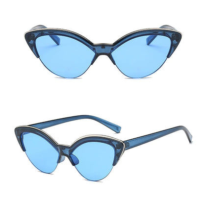 Blue cat-eye sunglasses with a white background