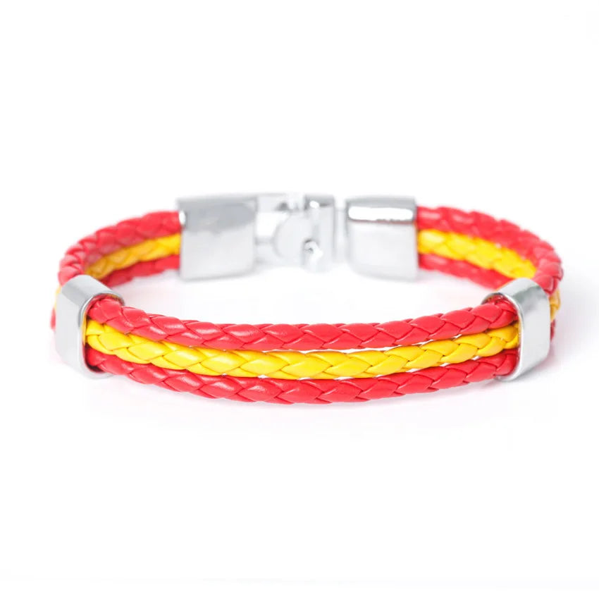 Bracelet with red and yellow braided design on a white background