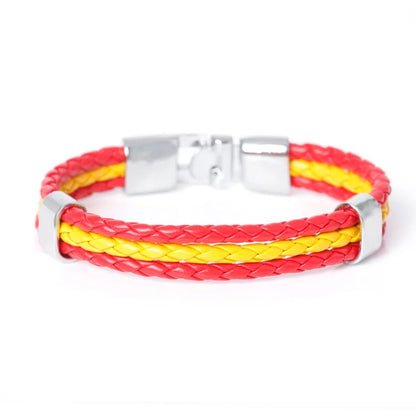Bracelet with red and yellow braided design on a white background