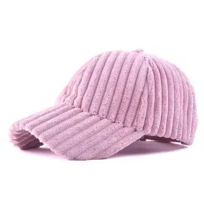 A light pink ribbed corduroy baseball cap shown from a three-quarters angle on a plain white background.