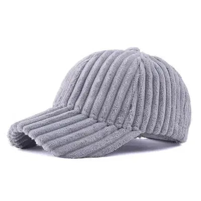 Grey ribbed design corduroy baseball cap on a white background