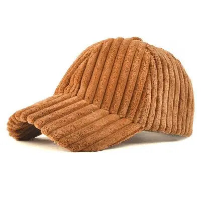 Brown ribbed corduroy baseball cap on a white background