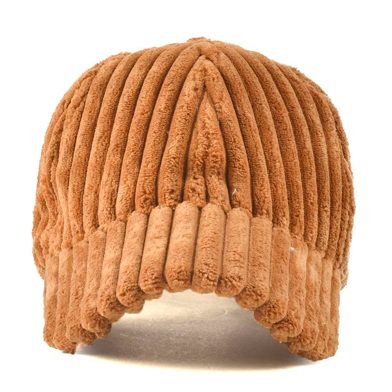 Brown ribbed knit beanie on a white background