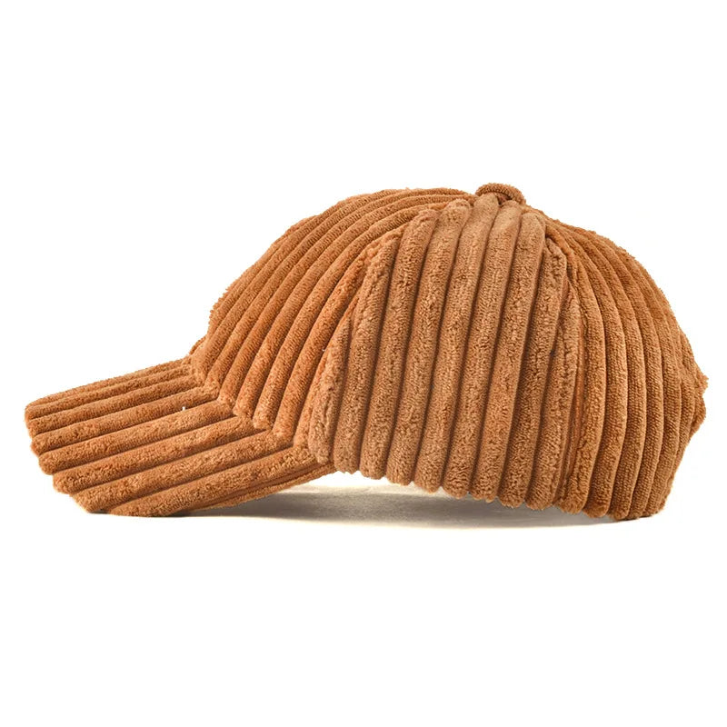 Brown ribbed knit cap on a white background