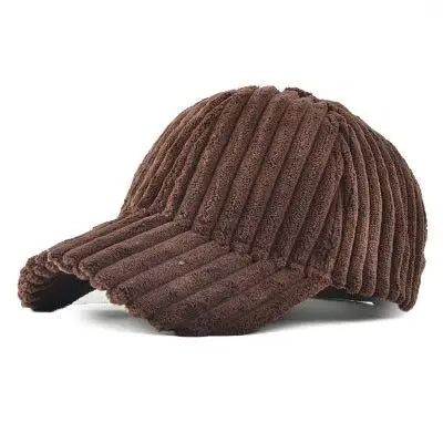 Brown ribbed corduroy baseball cap on a white background