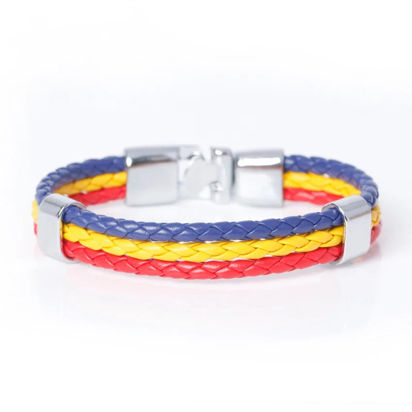 Bracelet with red, yellow, and blue braided design on a white background