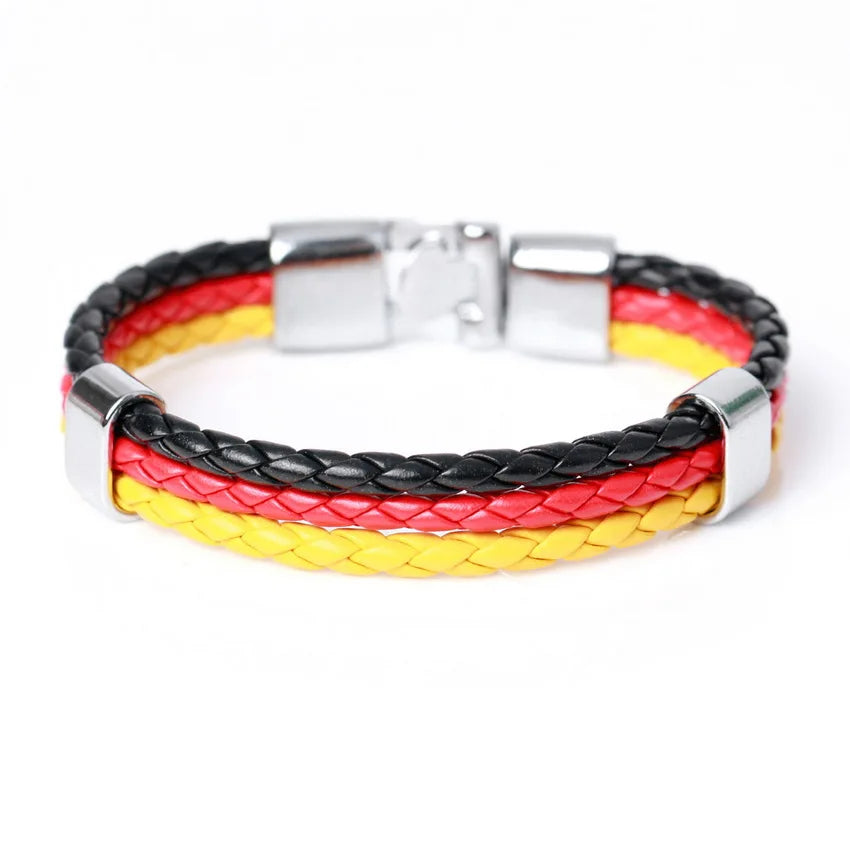 Bracelet with braided design in red, yellow, and black on a white background