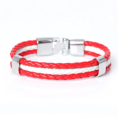 Red and white braided bracelet with a silver clasp on a white background