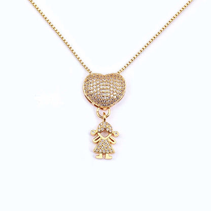 Gold necklace with a heart-shaped pendant and a small charm on a white background