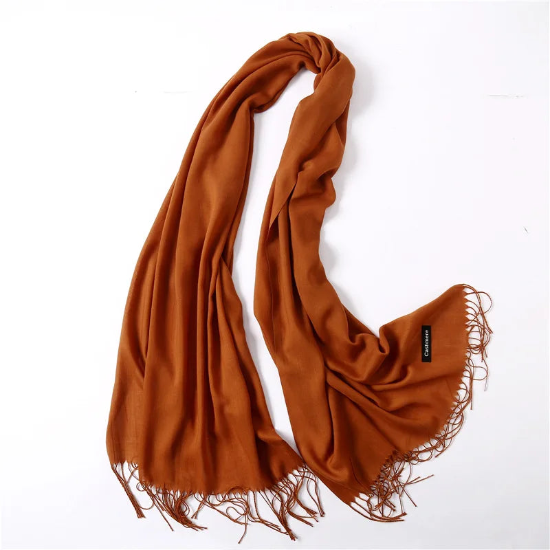 Brown scarf with fringes on a white background