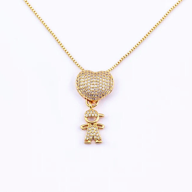Gold necklace with heart and child pendant on a white background