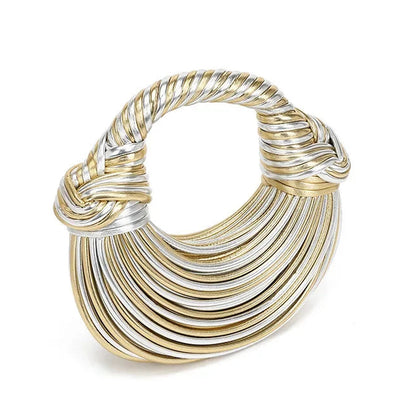 Gold and silver handbag on a white background