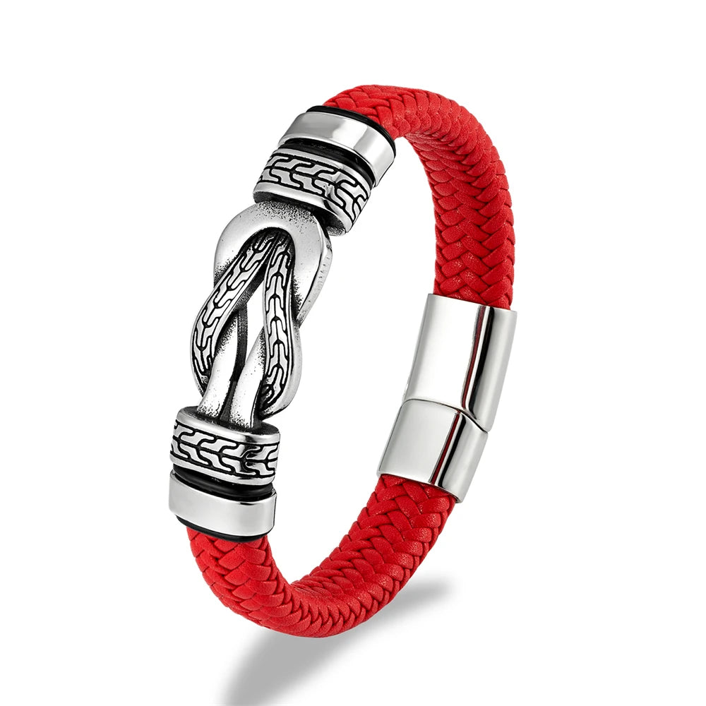 Silver bracelet with red braided cord on a white background