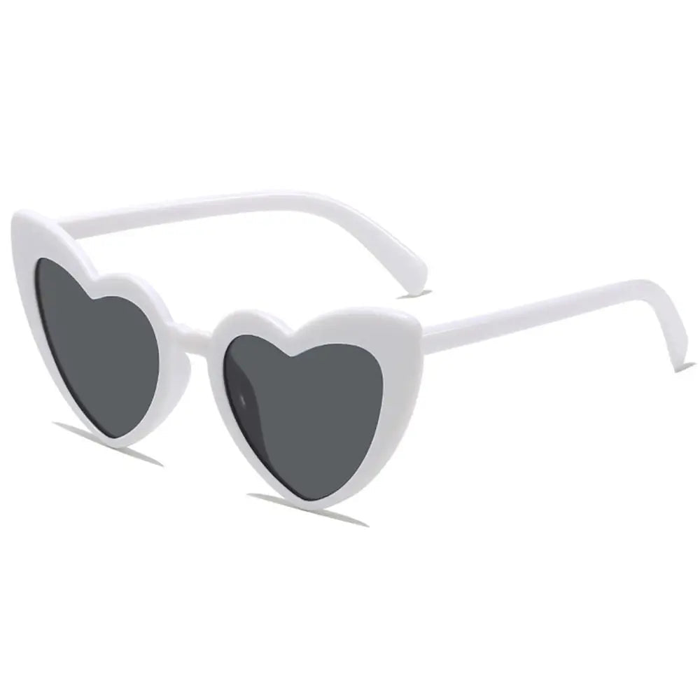 Sunglasses with white frames and black lenses on a white background