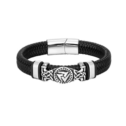 Black braided leather bracelet with silver metal clasp and decorative emblem on a white background