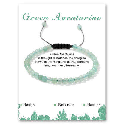 Green aventurine bracelet on a card with text about its properties