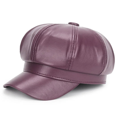 Purple leather cap on a white background