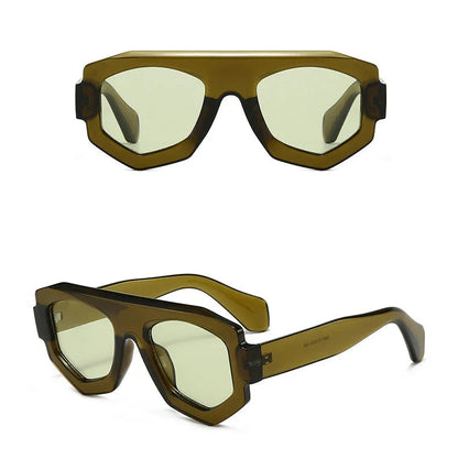 Sunglasses with a brown frame and yellow-tinted lenses on a white background.