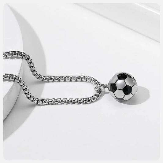 Silver chain necklace with a soccer ball pendant on a white background