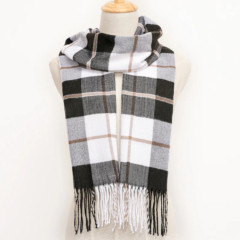 Plaid scarf with black, white, and beige colours on a mannequin against a white background