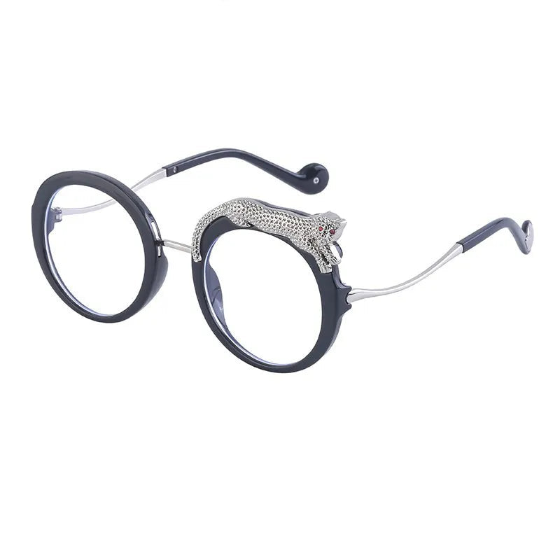 Elegant eyeglasses with decorative arm on a white background.