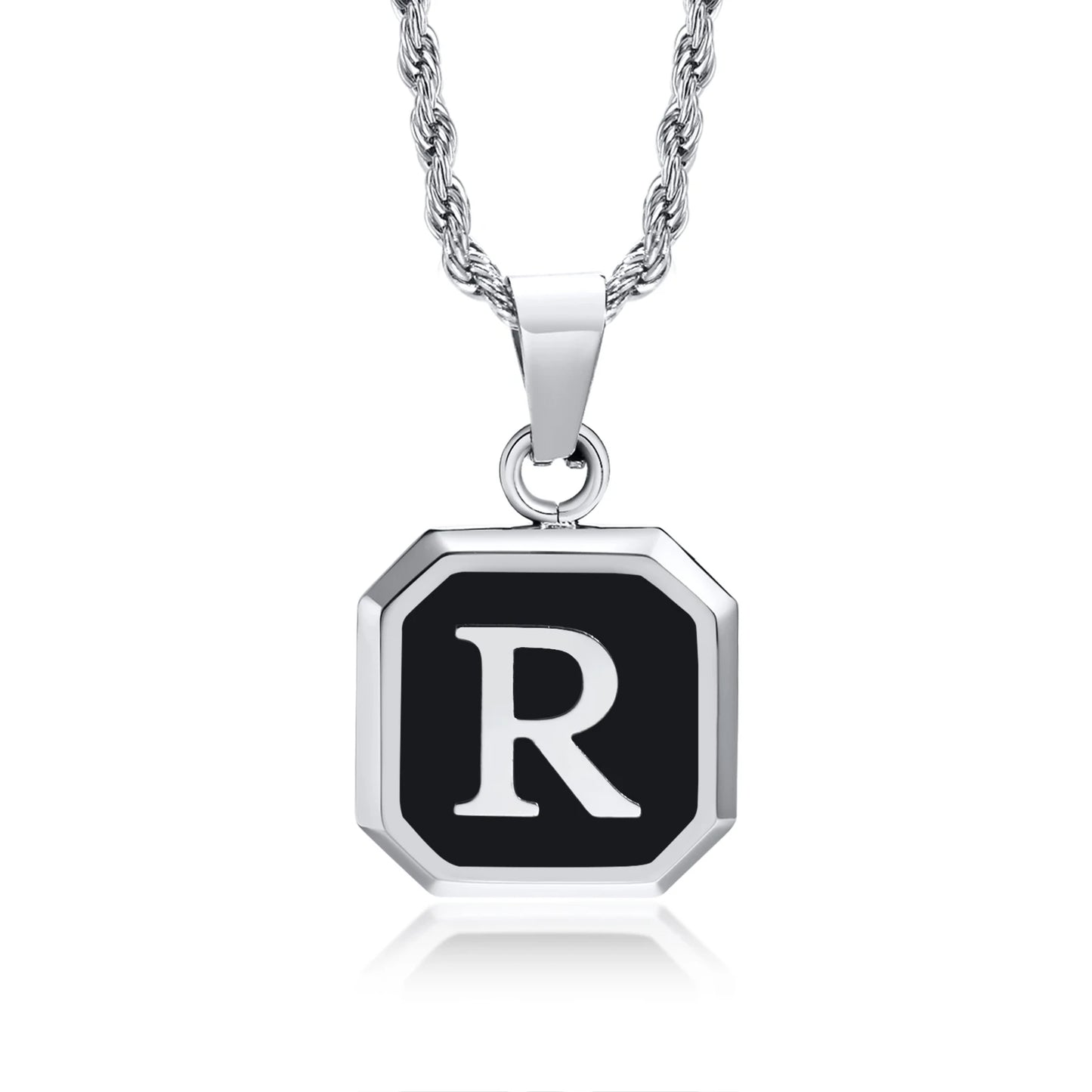 Necklace with a black octagonal pendant featuring the letter 'R' on a white background