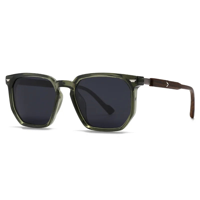 Sunglasses with dark lenses and a green frame on a white background