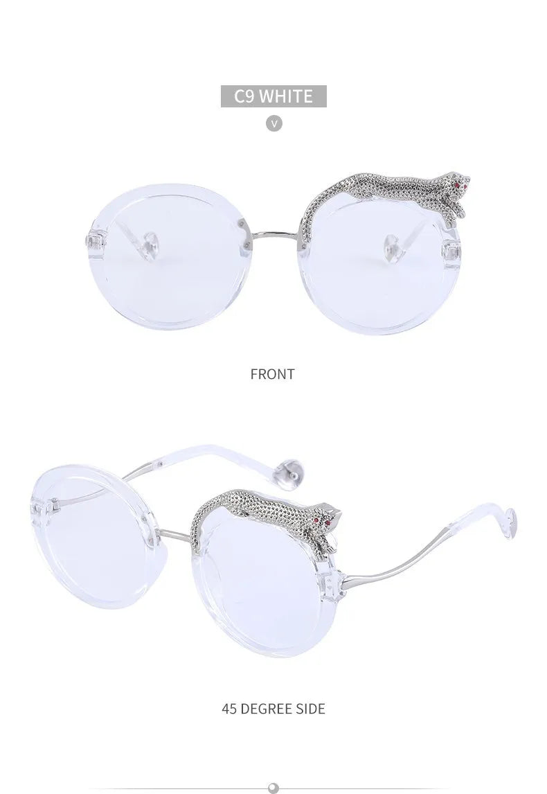 Transparent sunglasses with decorative metal frame on a white background