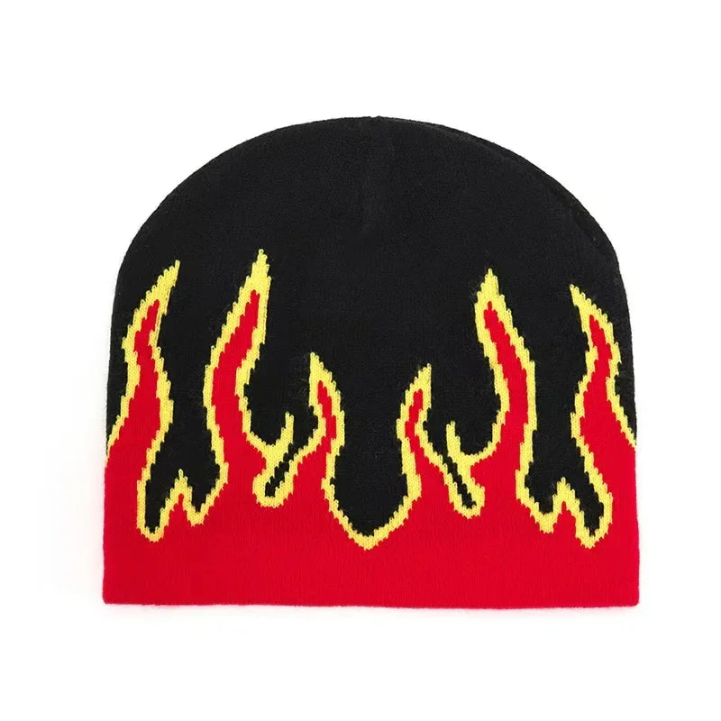 Black beanie with red and yellow flame pattern on a white background