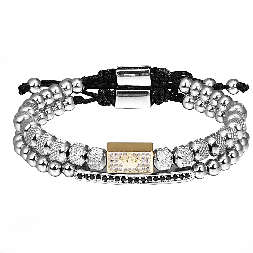 Two bracelets with silver beads and a gold charm on a white background