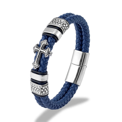A blue braided leather bracelet with a silver-toned cross charm, textured metal spacer beads, and a magnetic clasp, shown on a white background.