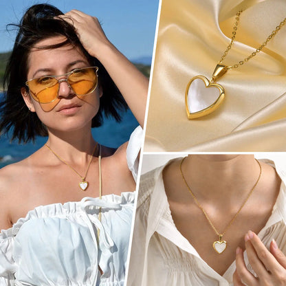 Woman wearing a gold necklace with a heart pendant by the beach and close-up of the pendant on beige fabric.