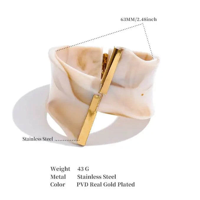 Gold and beige bracelet with measurements on a white background