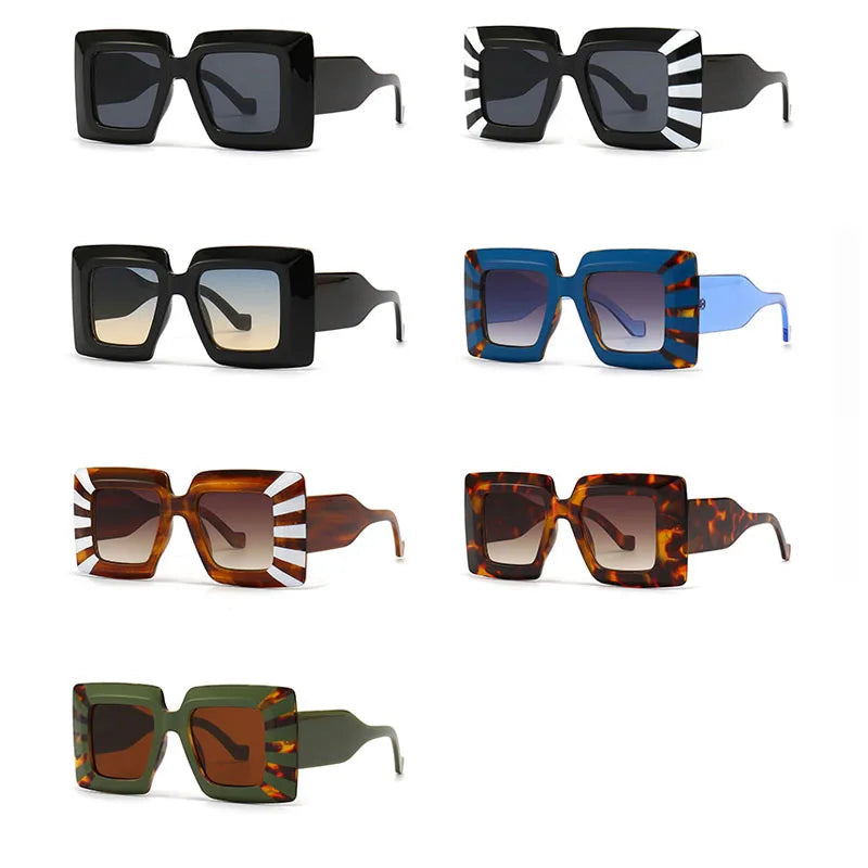 Collection of various sunglasses with different colour combinations on a white background