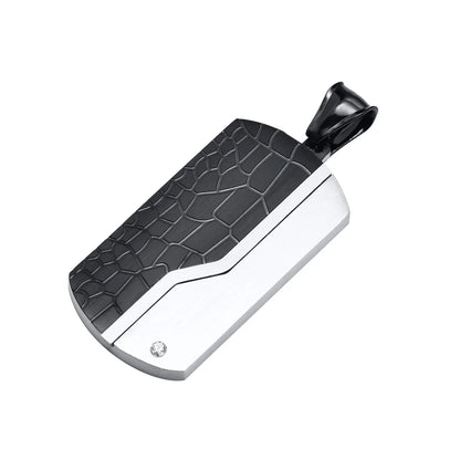 Black and silver pendant on a white background