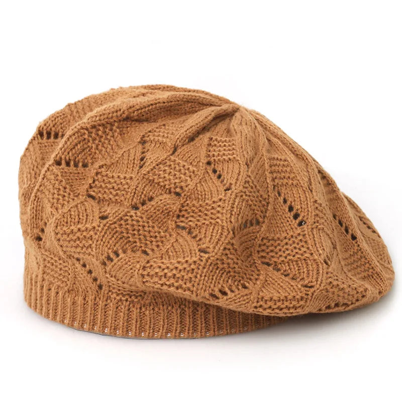 Brown knitted cap on a white background
