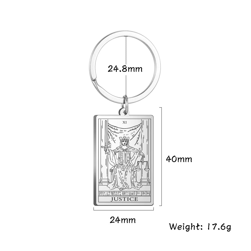 Keychain with tarot card design labeled 'Justice', showing measurements and weight on a white background.