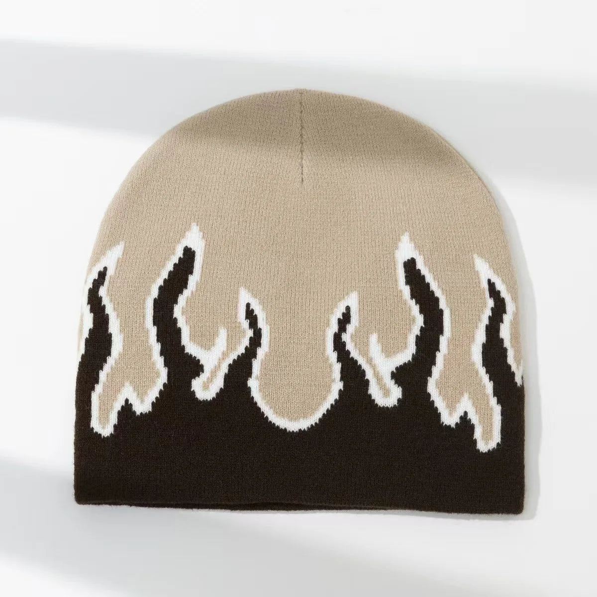 Knitted beanie with flame pattern on a white background