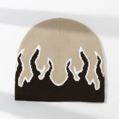 Knitted beanie with flame pattern on a white background