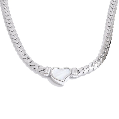 Silver chain necklace with a heart-shaped clasp on a white background