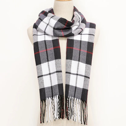 Plaid scarf with fringes on a mannequin against a white background
