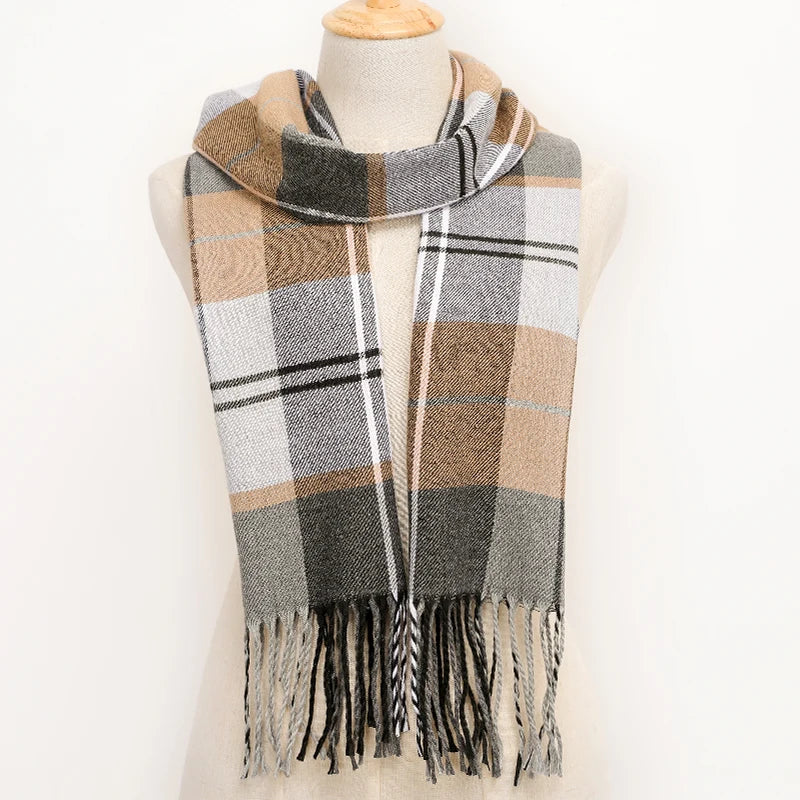 Plaid scarf with fringes on a mannequin against a white background