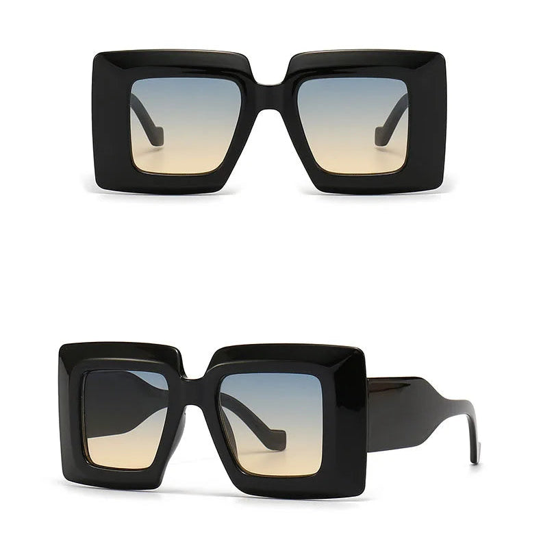 Black sunglasses with gradient lenses on a white background