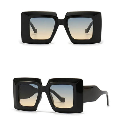 Black sunglasses with gradient lenses on a white background